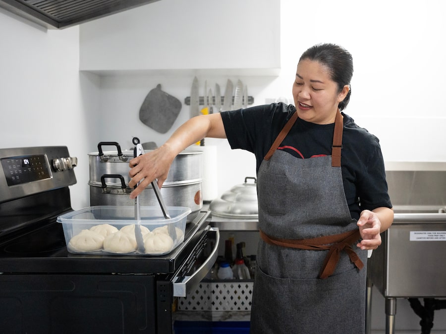 Crissy Ventura, a Filipino home cook, prepares siopao (steamed pork buns), in the commercial kitchen she built in her home in Halifax.