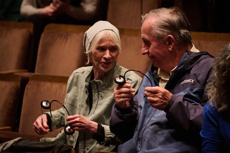 Audience members put on custom sound effect headphones before a preview run through of Medusa at Soulpepper theatre in Toronto on June 18.