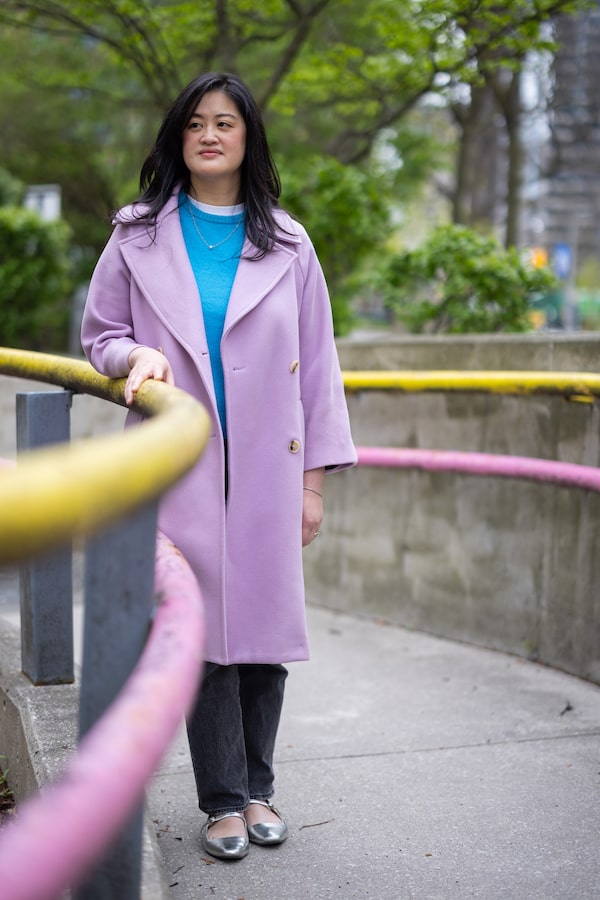 Ivanna Yau, Nurse Practitioner in the Epilepsy Program at Sick Kids, outside the hospital in May, where she would take quiet moments while on shift. Yau worked closely with Maryam Fatima’s family to help manage the baby’s seizures and she was instrumental in the decision to go forward with the groundbreaking brain surgery. Yau is currently on leave from Sick Kids, and was visiting Toronto in May.  
May 5, 2025
(Melissa Tait/The Globe and Mail)