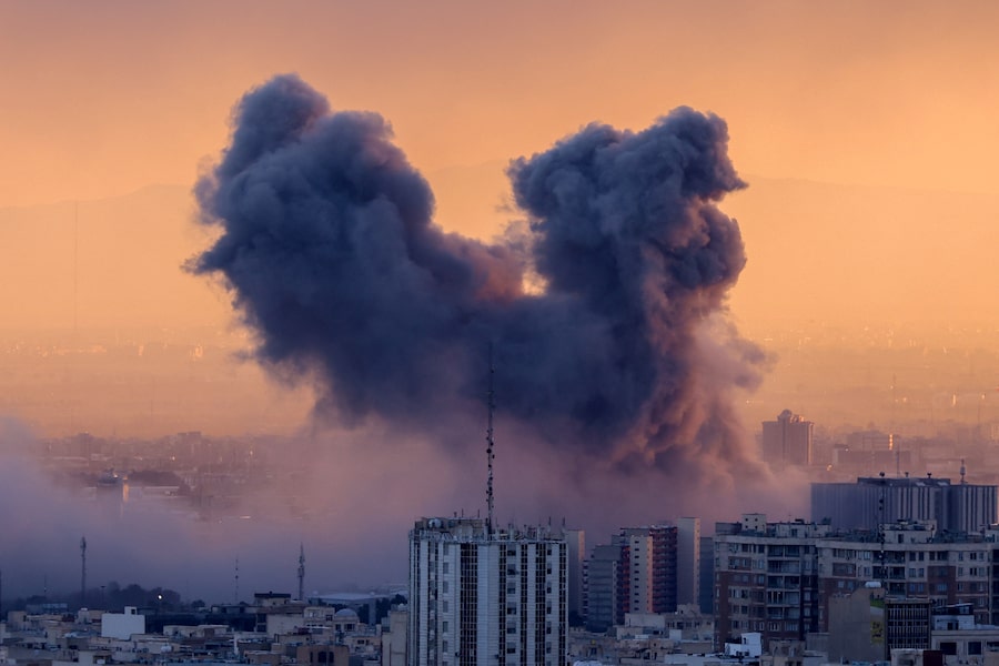 A plume of smoke rises after a strike on the Iranian capital Tehran, on March 3, 2026. The United States and Israel launched strikes against Iran on Feb. 28.
