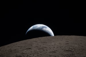 In this image provided by NASA, the Artemis II crew captured this view of Earth on April 6 as they flew around the Moon.