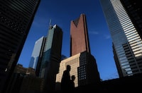 The Trump branded tower (center L) stands next to bank towers Scotia Plaza (center R), First Canadian Place (L) and Commerce Court (R) in the Bay Street financial district in Toronto, Canada on May 11, 2017. Also seen are the KPMG and Deloitte Towers if the Bay Adelaide Center. 