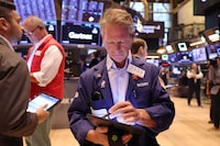 NEW YORK, NEW YORK - AUGUST 06: Traders work on the floor of the New York Stock Exchange during morning trading on August 06, 2024 in New York City. Stocks opened up slightly up in the three major indexes a day after the Dow Jones and the S & P 500 had their worst day of trading since 2022, amid a global market sell-off centered around fears of a U.S. recession. (Photo by Michael M. Santiago/Getty Images)