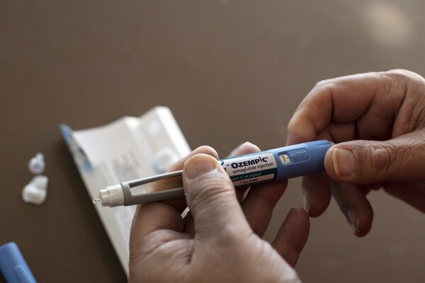 David Williams, 62, prepares a weekly shot of Ozempic for his wife Darlene Harris-Williams, 60, who has lost 86 pounds on the drug, at their Edmonton home. “It’s a crawl not a sprint,” says Harris-Williams who has dropped a steady 1-3 lbs every week. While Ozempic is a version of semaglutide that is intended for diabetes and not approved by Health Canada for obesity, many physicians now prescribe it for bariatric patients. In clinical trials patients taking semaglutide lost 10 to 15 per cent of their body weight.