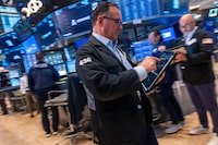 NEW YORK, NEW YORK - JULY 09: Traders work on the floor of the New York Stock Exchange (NYSE) on July 09, 2026, in New York City. Following the resumption of fighting between the US and Iran, stocks have fallen as global markets react to the news. (Photo by Spencer Platt/Getty Images)