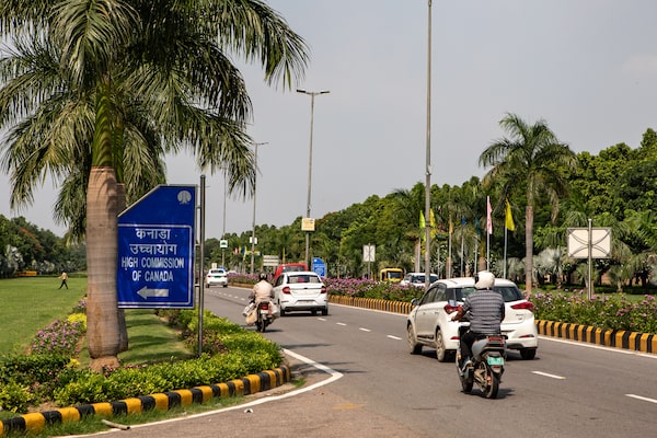 Traffic passes a sign to Canada's High Commission in New Delhi, India on September 20, 2023. Relations between India and Canada entered the deep freeze this week after Ottawa accused New Delhi of being involved in the killing of a Sikh leader in British Columbia.