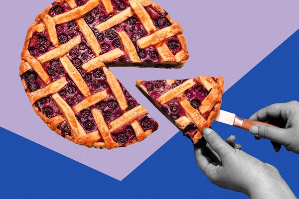 Hands cutting a slice of pie