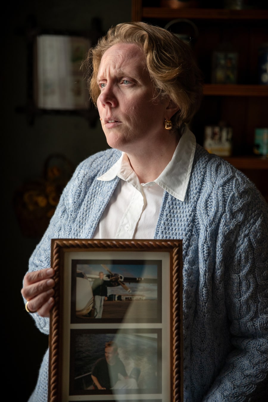 Sarah Dillon holds a portrait of her late brother Thomas Dillon, 45, who accessed MAID in London, Ont., in 2024.  The Globe and Mail has learned that one of the complaints against an Ontario doctor relates to Mr. Dillon's case.
