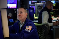 Traders work on the floor at the New York Stock Exchange (NYSE) in New York City, U.S., February 27, 2026.  REUTERS/Brendan McDermid