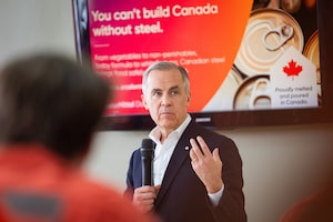 Prime Minister Mark Carney gives remarks at an ArcelorMittal Dofasco facility in Hamilton, Ont., on March 29.