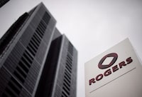 A Rogers Communications Inc. logo outside the Rogers Building in Toronto on Tuesday, April 22, 2014.  