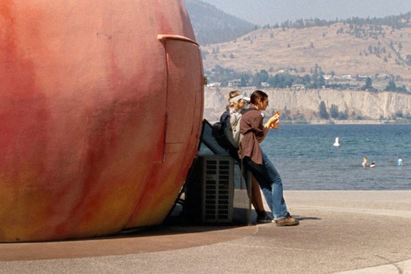 Until Branches Bend (2022). Robin (Grace Glowicki) works as a grader for a cannery. When she discovers a peach that has been burrowed into by a beetle, she alerts her boss (Lochlyn Munro), who insists it’s probably nothing. But when her curiosity gets the best of her, it sets in motion a chain reaction that jeopardizes the economic stability of her town — as well as her social standing within it. Meanwhile, there is another discovery: an unwanted pregnancy from an illicit affair. Courtesy of Photon Films