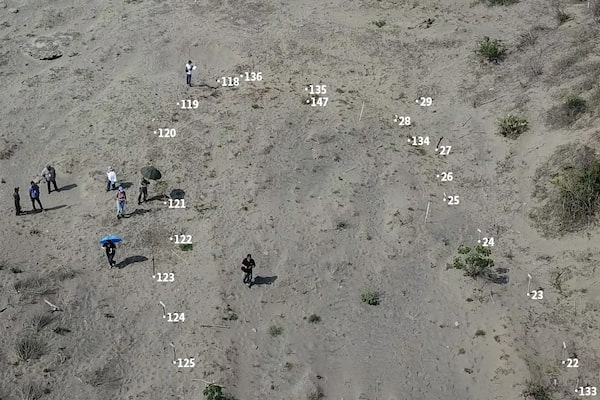 A screen grab from drone footage of Colinas de Santa Fe with additional text applied in post