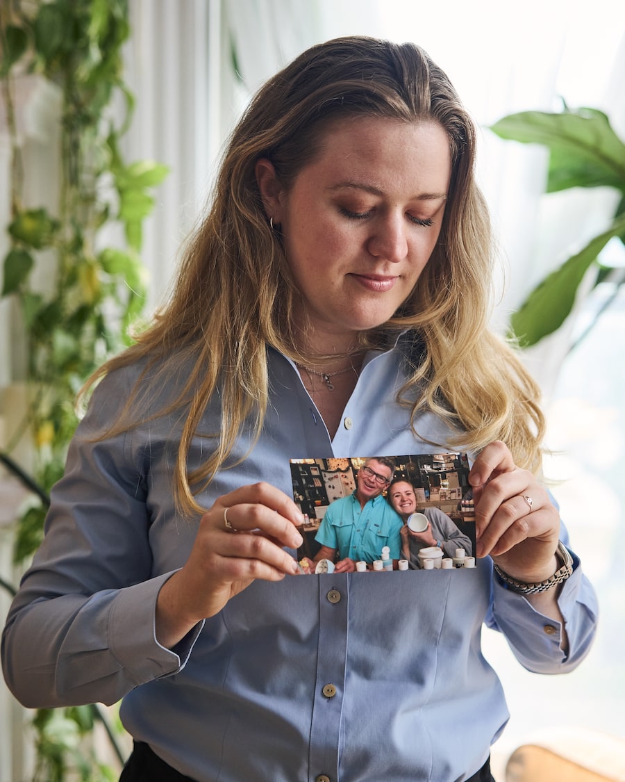 Lane Carter holds a photo of her father Price Carter, who died by MAID in 2025. Mr. Carter is one of more than 76,000 people who have chosen to end their lives with MAID in the past decade.