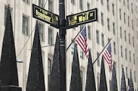 A sign marking the intersection of Broadway and Wall Street is shown in New York's Financial District on Oct. 30, 2024.  
