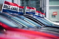 Used vehicles for sale are seen at an auto mall in Ottawa, on Monday, April 26, 2021. THE CANADIAN PRESS/Justin Tang