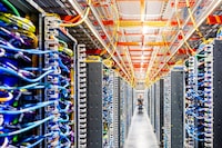 A technician works at an Amazon Web Services AI data centre in New Carlisle, Ind.
