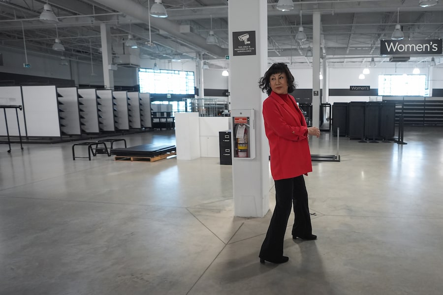 Ruby Liu tours a former Hudson's Bay-owned Saks Off 5th department store after a 'handover ceremony' where she received the keys to the space she owns at Tsawwassen Mills shopping mall in Tsawwassen, B.C., in June.