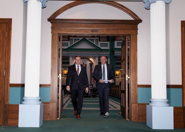 Quebec Premier Francois Legault and Newfoundland and Labrador Premier Andrew Furey arrive at a joint news conference in St. John's to discuss the future of the Churchill Falls agreement on Feb. 24, 2023.