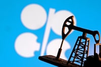 FILE PHOTO: A model of an oil pump is seen in front of the OPEC logo in this illustration taken January 9, 2026. REUTERS/Dado Ruvic/Illustration/File Photo