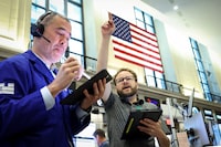 Futures-options traders work on the floor at the New York Stock Exchange's NYSE American (AMEX) in New York City, U.S., June 1.