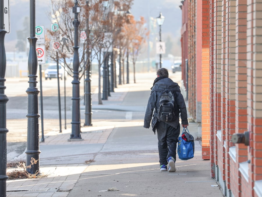 A homeless man walks in downtown Medicine Hat, Alta. The latest PiT count identified 102 people experiencing homelessness in the city of roughly 65,000.
