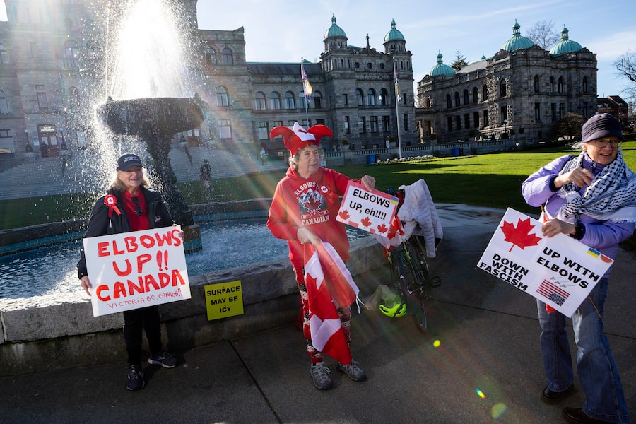 Roz Isaac, Norah Scholten and Suzanne Crawley, protesting at the B.C. legislature last month, describe themselves as part of a Canadian resistance. ‘The chances of being invaded by the United States is not zero,’ Ms. Scholten says.