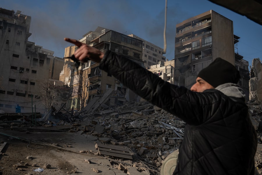 A man gestures at the site of an Israeli air strike in Bachoura, a neighbourhood in central Beirut, on March 18.