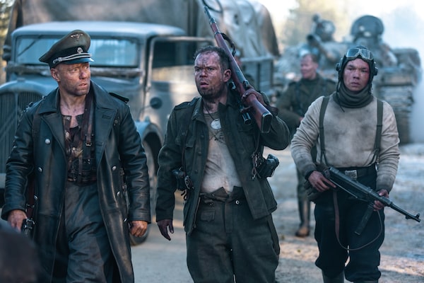 Aksel Hennie as Obersturmführer Bruno Helldorf, Jack Doolan as Wolf and Omni Tommila as Schütze in SISU. Credit: Lionsgate