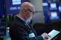 NEW YORK, NEW YORK - MAY 26: Traders work on the floor of the New York Stock Exchange during morning trading on May 26, 2026 in New York City. Stocks traded higher at the opening amid a potential U.S.-Iran deal being reached to end the war. (Photo by Michael M. Santiago/Getty Images)