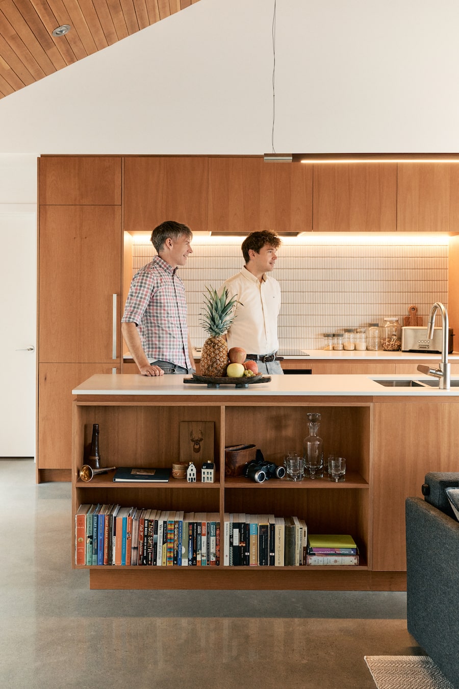 Matthew Hague and his husband, Matthew (left), prioritized Canadian-designed and made furnishings throughout their Quebec cabin. 