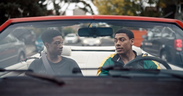 BROTHER (2022). Francis (Aaron Pierre) and Michael (Lamar Johnson) are brothers who immigrated to Canada in the 1990s and are fiercely protective of each other. Francis, in particular, has his foot in different worlds: one of violence and danger and the other of his family. The film also follows Michael as he navigates a suburban landscape and his own temptations with the dark side. Courtesy of Elevation Pictures