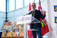 Ontario Education Minister Paul Calandra speaks at an announcement at a school in Ottawa, in December 2025. In an effort to tackle high absentee rates, attendance and participation will count for a percentage of Ontario high school students' final grade. 