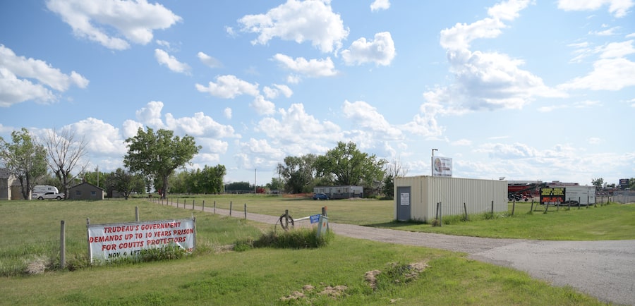  A side road to Highway 3 in Taber, Alta., has a sign about the Coutts standoff of 2022, when groups opposed to COVID-19 restrictions blockaded a crossing between Alberta and Montana.