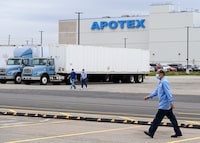 Apotex workers are shown in Toronto on Friday, April 9, 2021. THE CANADIAN PRESS/Nathan Denette
