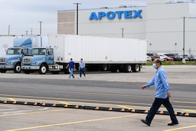Apotex workers are shown in Toronto on Friday, April 9, 2021. THE CANADIAN PRESS/Nathan Denette