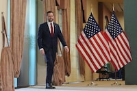 Vice President JD Vance arrives for a news conference after meeting with representatives from Pakistan and Iran in Islamabad on April 12, 2026. Top-level peace talks between the United States and Iran entered a second day early April 12, as Washington piled pressure by saying it had sent minesweeping ships through the vital Strait of Hormuz. (Photo by Jacquelyn MARTIN / POOL / AFP via Getty Images)