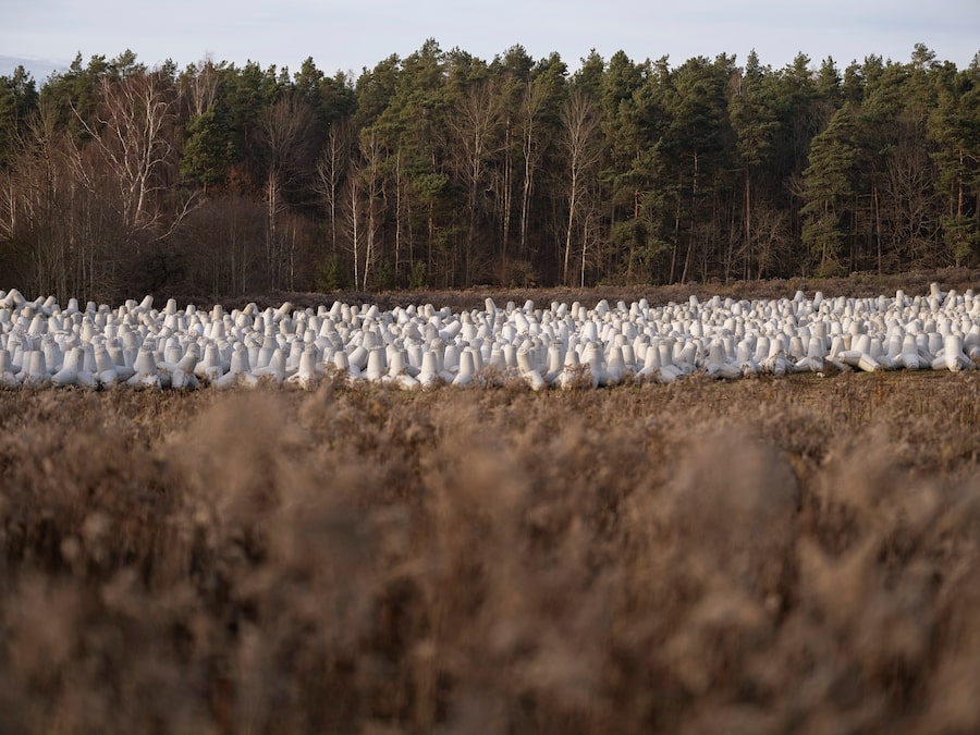 Along Poland's border with Russia’s Kaliningrad Oblast, concrete anti-tank hedgehogs and cement structures fortify a portion of the Eastern Shield, an 800 kilometre-long defence line along its northern and eastern borders.