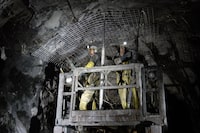 Rock bolting on a scissor lift at Wesdome's Kiena Mine in Val d'Or, Quèbec.