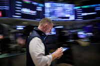 A trader works on the floor at the New York Stock Exchange (NYSE) in New York City, U.S., March 7, 2024.