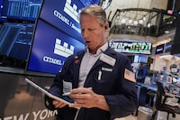 Trader Robert Charmak works on the floor of the New York Stock Exchange, Monday, June 15, 2026. 