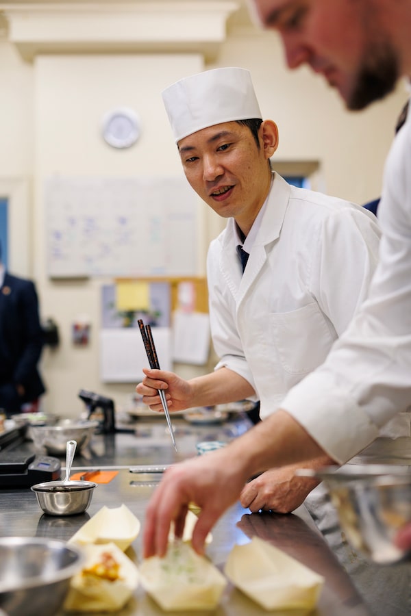 Philippe Cameron, Executive Chef of the Canada Pavilion at Expo 2025 Osaka and Yasuhiro Shima, the Ambassador's Chef at the Embassy of Japan, right, in the kitchen of the Japanese Ambassador’s Official Residence in Ottawa in early February 2026. 