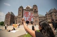 Protesters gather outside the Legislative Assembly of Ontario to protest Bill 5 on June 4, 2025. (Fred Lum/The Globe and Mail)