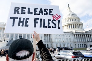 A demonstrator outside the U.S. Capitol yesterday.