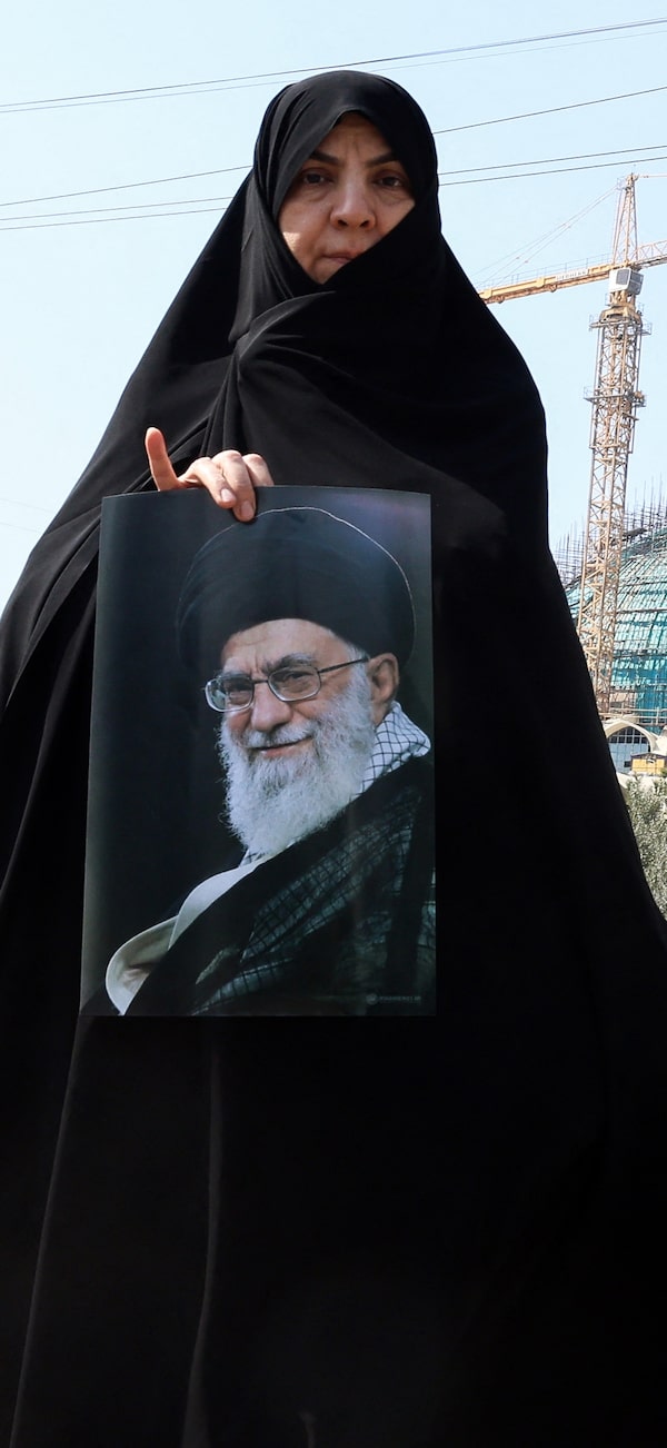 At Friday’s prayers, several worshippers at Tehran’s Imam Khomeini mosque had posters of the late Ayatollah Ali Khamenei, who died last week in air strikes.