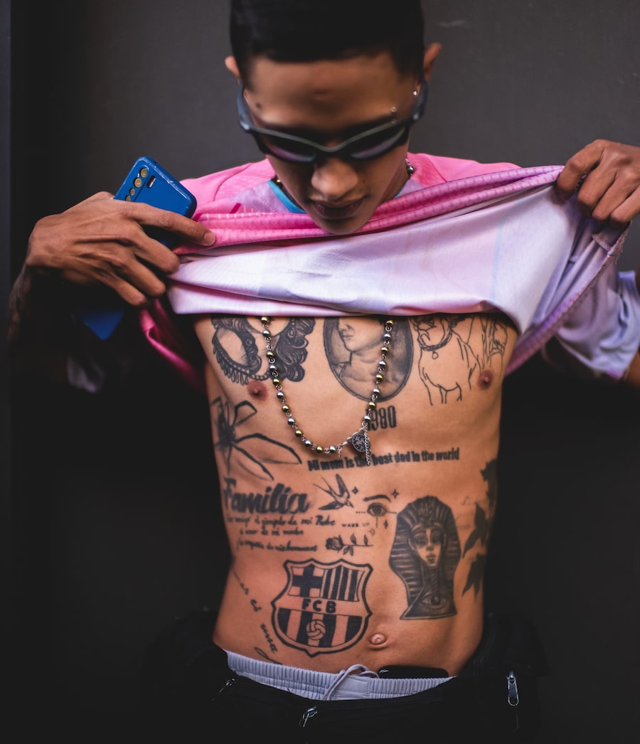 A Colombian fan of FC Barcelona, whose emblem is tattooed on his stomach, was one of thousands to come see the team at Oct. 26’s match against Real Madrid. ‘El Clásico,’ the name for any official game between the teams, is a time-honoured soccer tradition in Spain. 