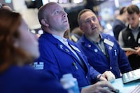 NEW YORK, NEW YORK - JULY 01: Traders work on the floor of the New York Stock Exchange during morning trading on July 01, 2026 in New York City. Stocks opened up with losses on the first day of trading in the month of July after the market had its best quarter since 2020.  (Photo by Michael M. Santiago/Getty Images)