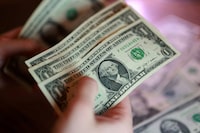  U.S. dollar banknotes are seen in this illustration taken March 24, 2026. 
