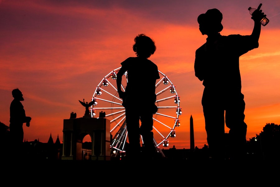 Visitors explore the Great American State Fair on the National Mall in Washington, June 30.