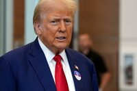 Republican presidential nominee former President Donald Trump talks at the Palm Beach County Supervisor of Elections, Wednesday, Aug. 14, 2024, in West Palm Beach, Fla., as he votes early in person in the Florida primary.